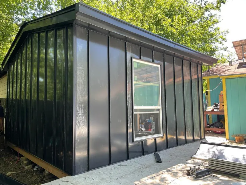 Black standing seam metal wall panels for Roof Inspection in Wentzville