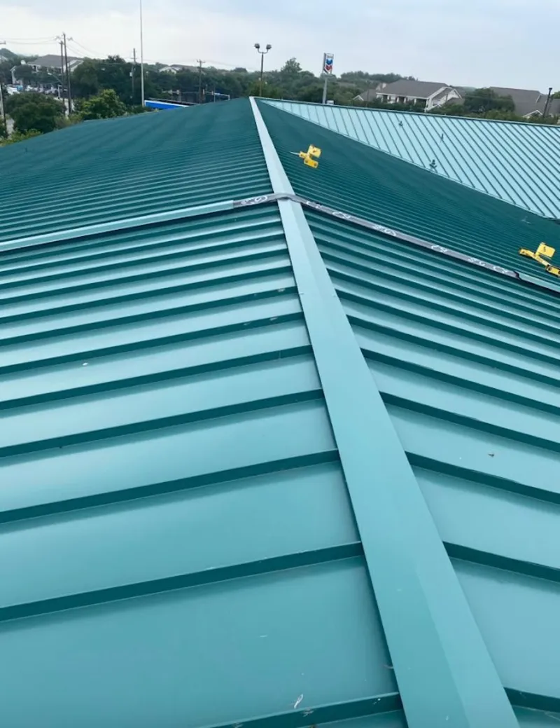 Green commercial metal roof ridge and valley for Metal Roof Repair in Wentzville